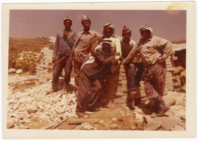 William Farah with Friends at a Construction Site in Deir Jarir