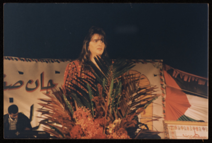 Abeer Sansur at the Saffa Heritage, Culture, and Art Festival, Handala Cultural Center, 1998	