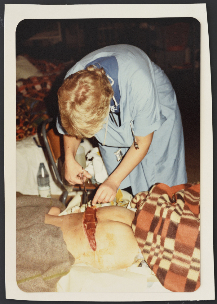 Nurse Volunteer Treating an Injured Person  