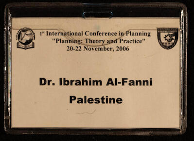 بطاقة مشاركة صادرة لإبراهيم الفنّي في المؤتمر الدولي الأول للتخطيط