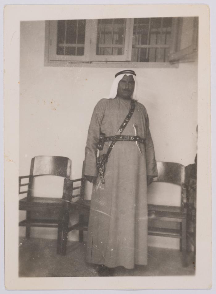 A Photograph of Ibrahim abu Sitteh Wearing a Hatta, Iqaal and Abaya