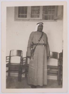 A Photograph of Ibrahim abu Sitteh Wearing a Hatta, Iqaal and Abaya
