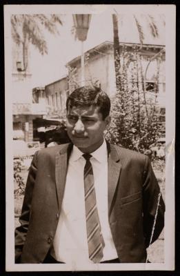 Ali Fodeh in a Suit and a Tie 