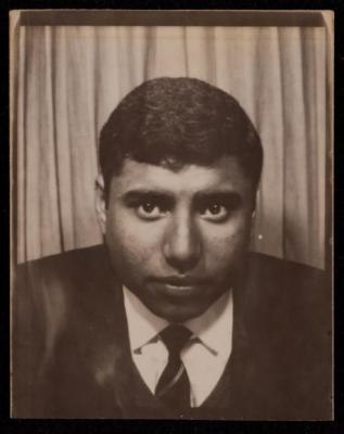 A Studio Portrait of Ali Fodeh in a Suit