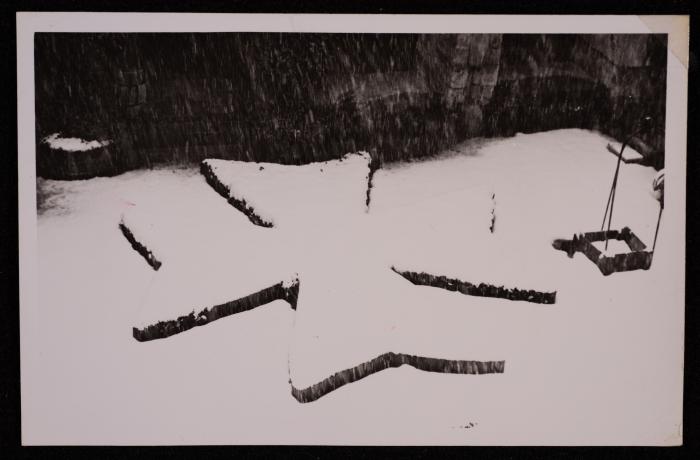 A Stone Cross Covered in Snow, a Photograph by Yousef Albina, the 1920s-30s