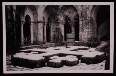 A Stone Cross Covered in Snow, a Photograph by Yousef Albina, the 1920s-30s
