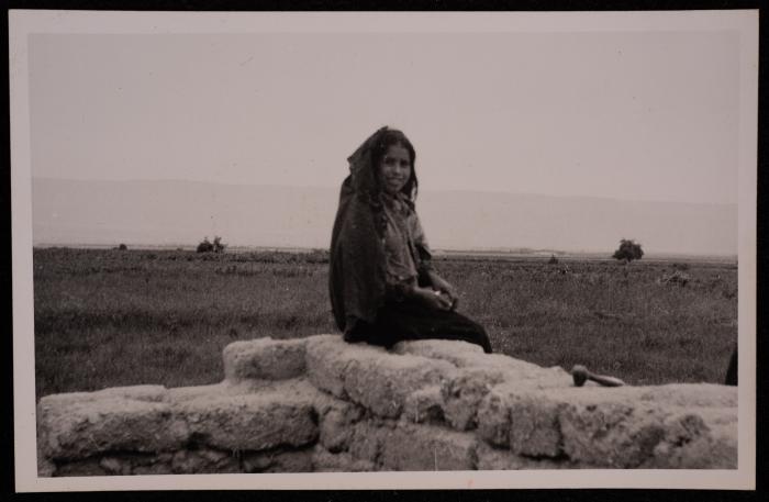 A Girl Wearing a Thobe in the East Desert of Bethlehem, a Photograph by Yousef Albina, the 1950s