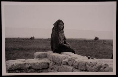 A Girl Wearing a Thobe in the East Desert of Bethlehem, a Photograph by Yousef Albina, the 1950s