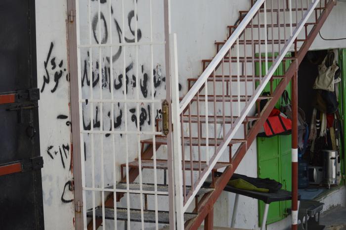 صورة لعبارات وطنية على جدار منزل في مخيم الدهيشة، بيت لحم، 2015