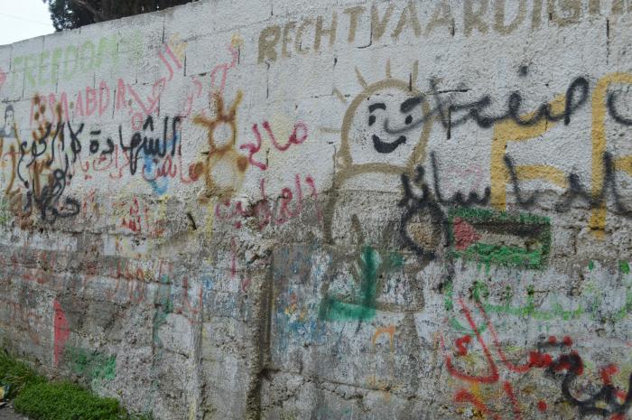 A Photograph of Phrases and Drawings on a Wall in ad-Dheisheh Camp, Bethlehem, 2015.