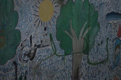  صورة لرسومات على أحد الجدران في مخيم الدهيشة، بيت لحم، 2015