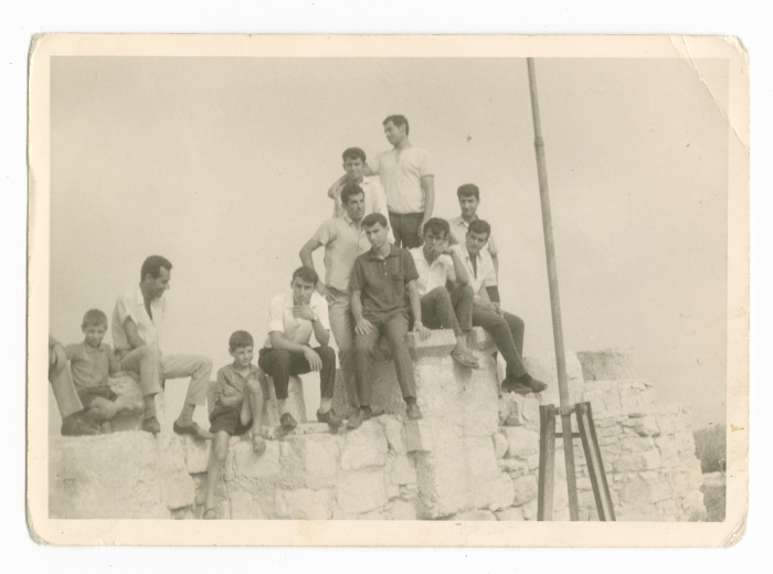 A photo of Palestinian men and children
