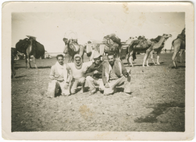 A Group of Men Seated Near a Water Well in Badna, Saudi Arabia