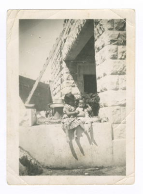Two Children from the ʿubayd Family in Front of their Home in Isawiya