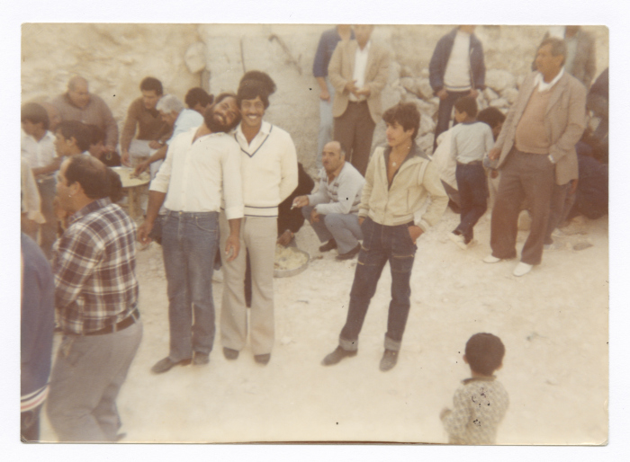 Men at the Weeding in Isawiya