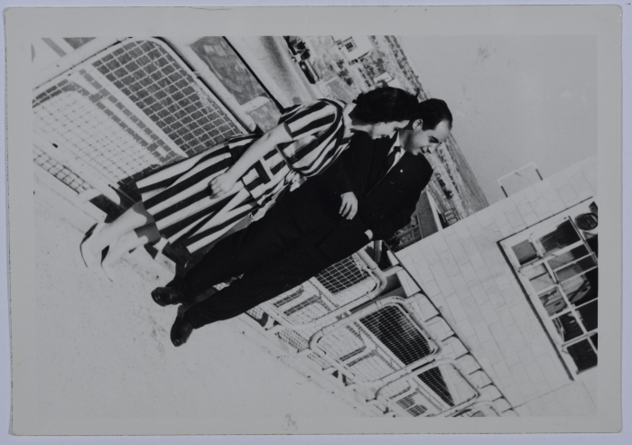 A Photograph of a Girl and a Man