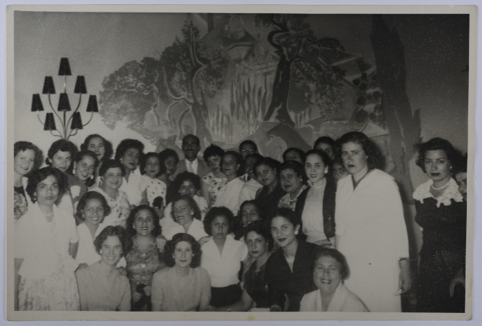 A Photograph of Men and Girls