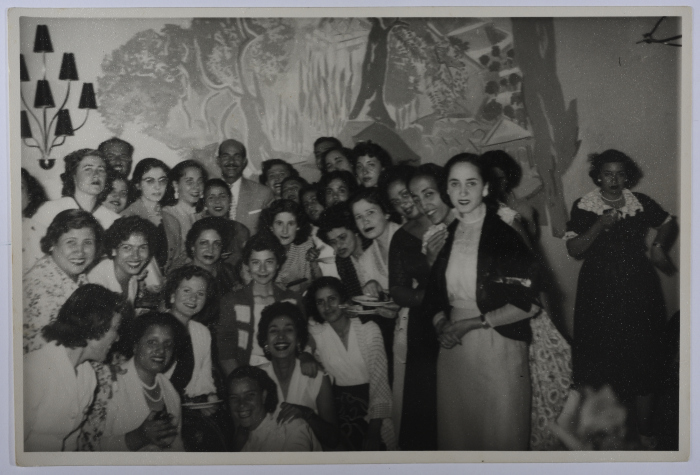 A Photograph of Men and Girls, 1956