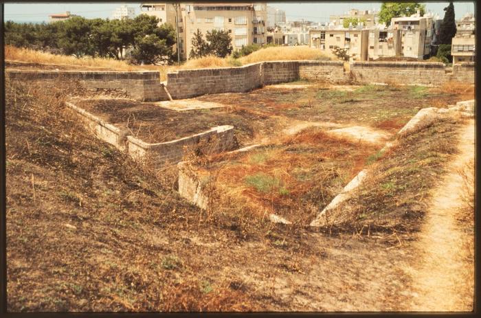 A Photograph of the Remains of an Archaeological Site and Wall in the Occupied City of Acre in the 1990s