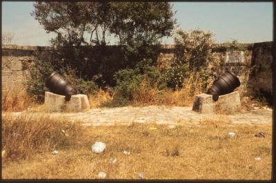 A Photograph of Two Ottoman Cannons Erected on al-Jazza Wall in the Occupied City of Acre in the 1990s 