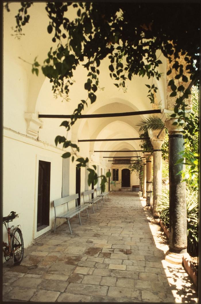 A Photograph of a Corridor in front of the Rooms Surrounding al-Jazzar Mosque in the Occupied City of Acre in the 1990s 
