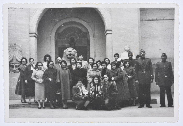 A Photograph of Men and Women