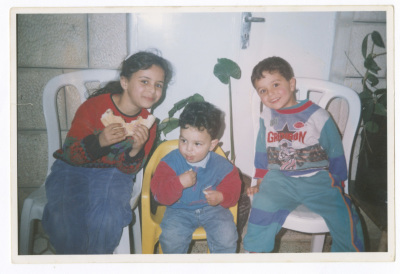 Three siblings from Ayyash family; with Shaheed Milad Ayyash in the middle
