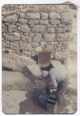 A man filling up water