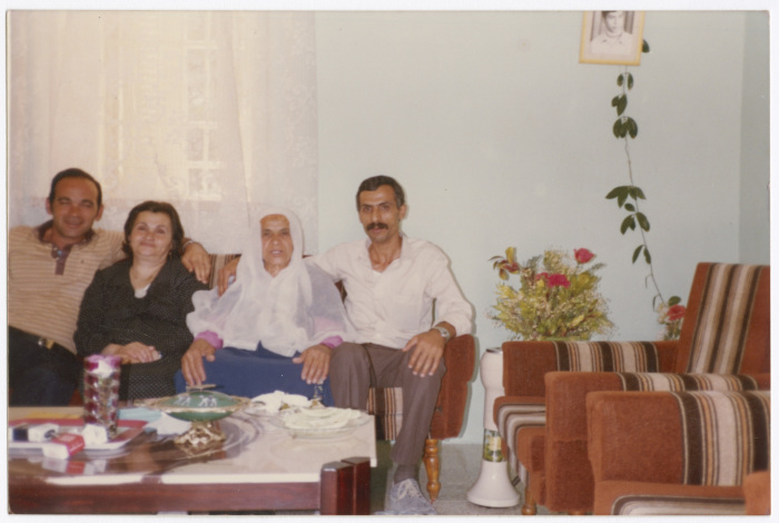 A prisoner and his mother with their relatives