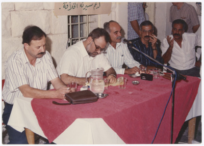 Men in a political seminar; including Saeb Erekat