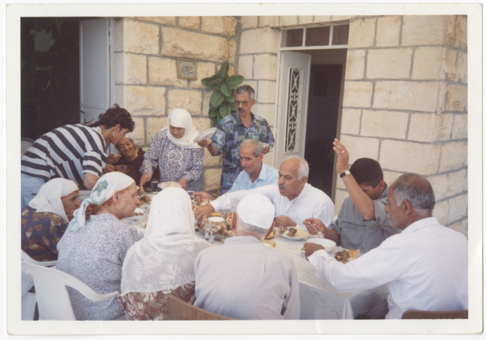 Relatives having dinner; as a celebration after the release of their relative from prison