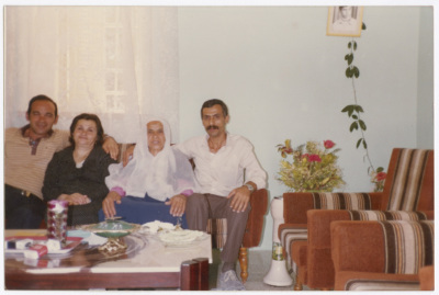 A prisoner and his mother with their relatives