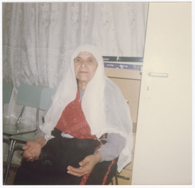 An old women in a traditional dress