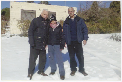 A memorial photo of relatives in the snow; with Shaheed Milad Ayyash in the middle