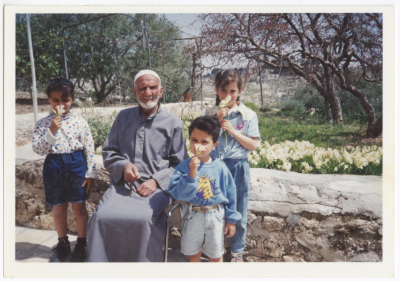 An old man with children