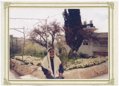 Ali Ayyash in the garden of his house
