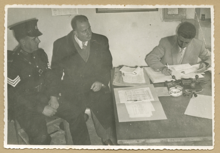 Checking passports at the Mandelbaum Gate
