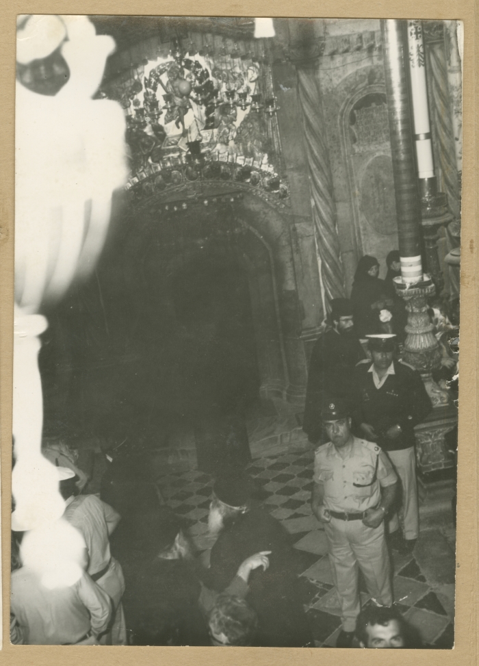 Palestinian officers in the Israeli Police inside the Church of the Holy Sepulcher during the Holy Saturday