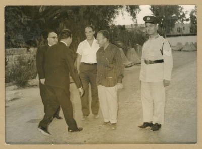 Welcoming visitors at the Mandelbaum Gate