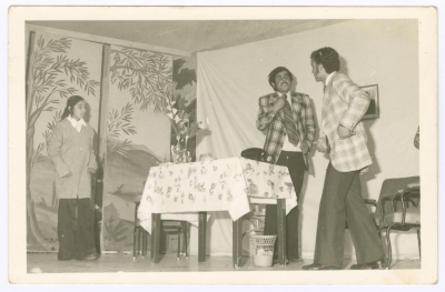 Two men and a woman during a theatrical performance at the Catholic Community Hall in Ramallah on the 1st of May