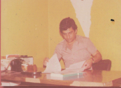 Director of the Voice of Palestine Radio in Beirut during his review of a radio material