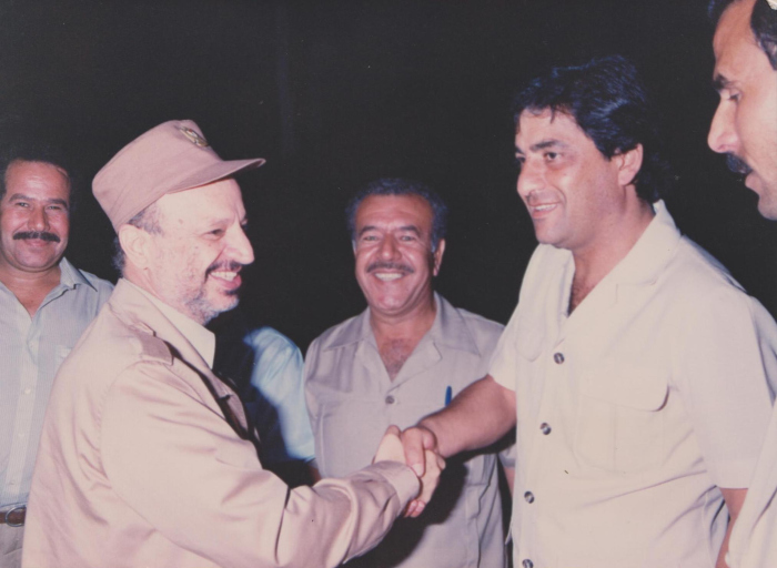 Late Palestinian President Yaser ʿarafat with Heads of the Palestinian Workers Union