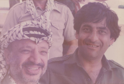 Late Palestinian President Yaser ʿarafat with a man from Amr family during their trip to Athens after leaving Beirut