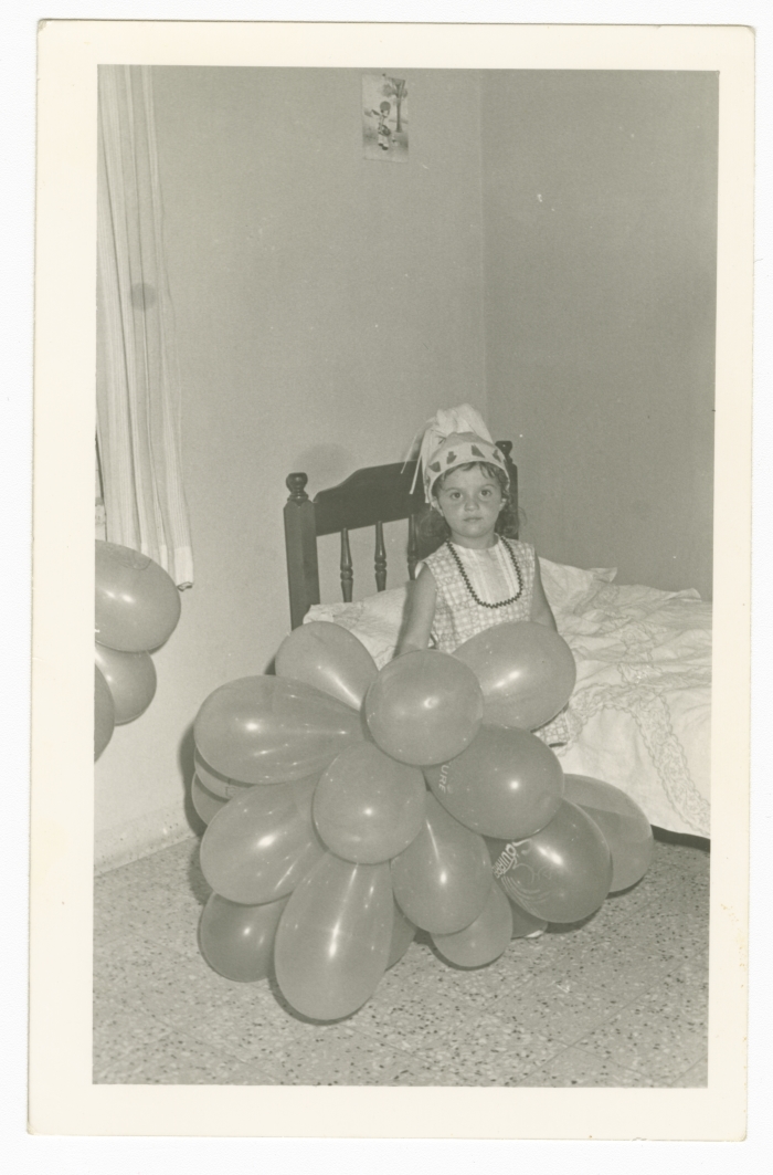 Samia Joubran Holding Balloons on Christmas 
