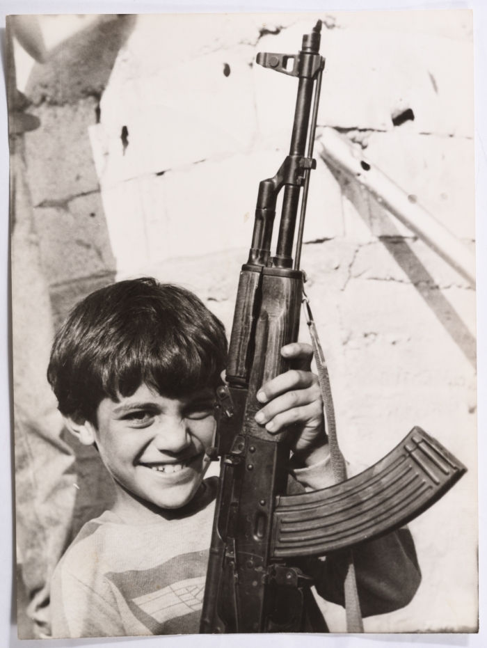 An Armed Child in Bur al-Barajneh Camp 