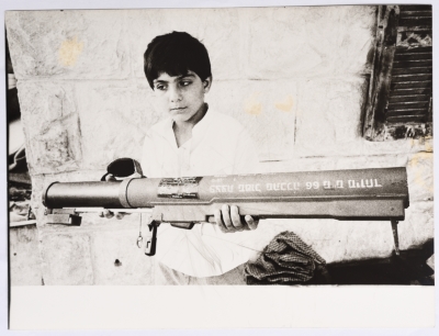 A Palestinian Child in Southern Lebanon Holding a Zionist Gun