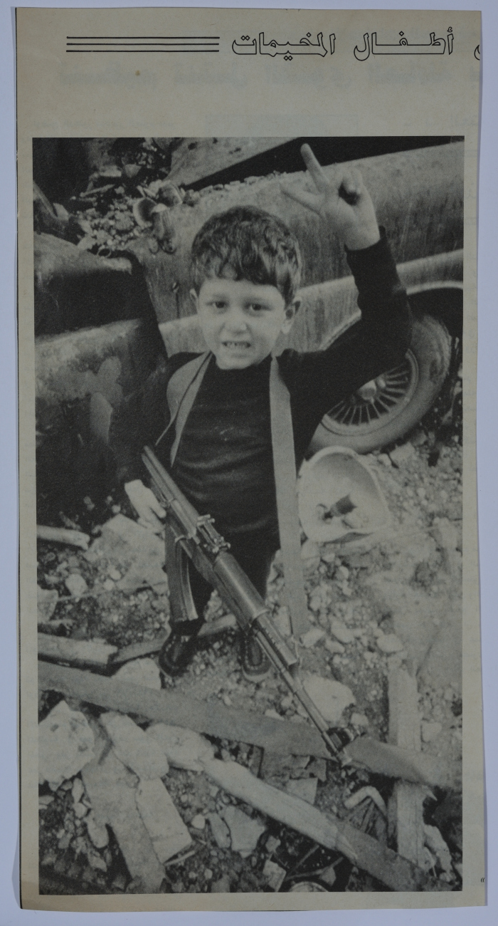 A Child from the Refugee Camps Holding a Rifle During the War of the Camps 