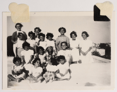 One of the Supervisors at the Evangelical Home and School with Students at the House in Ramallah 