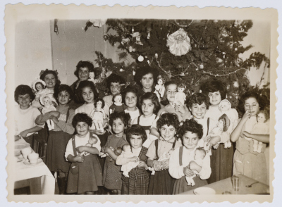 Children Holding their Dolls at the Evangelical Home and School in Ramallah on Christmas 

