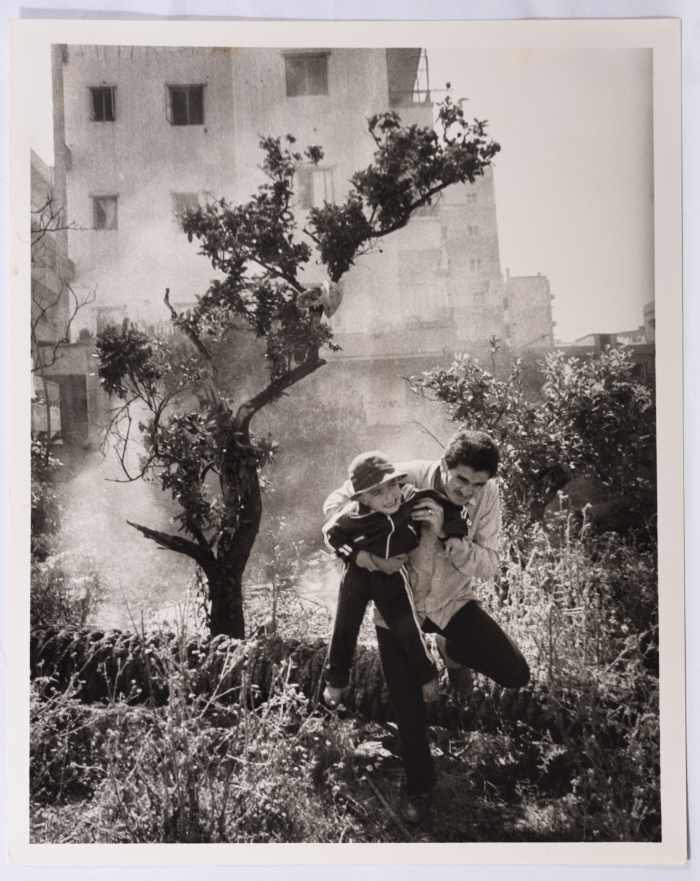 A Father and Son during the Bombardment of Camps, South Lebanon